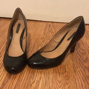 Black high heeled pumps size 7